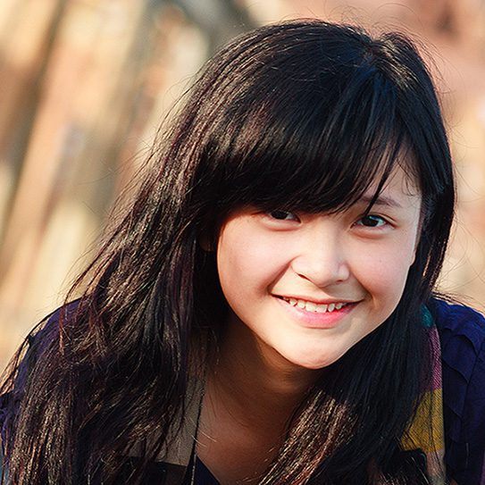 Woman with clear aligners in Forney, TX